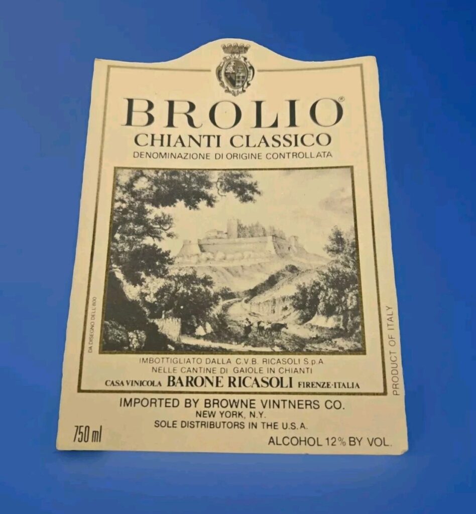 Close-up of a Chianti Classico wine label (Brolio by Barone Ricasoli), showing the denomination on the front label.